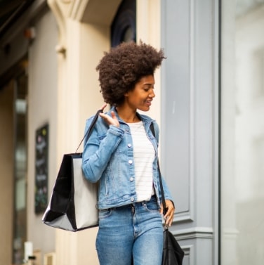 Woman smiling and shopping